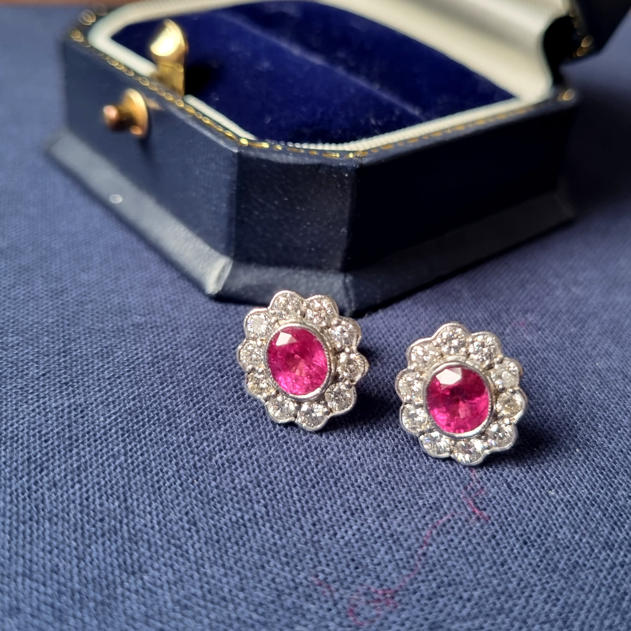 A Pair of Ruby and Diamond Cluster Stud Earrings
